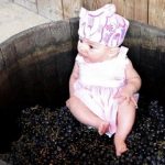 baby on grapes